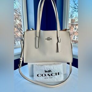 Coach “Charlie” Carryall in Cream & Tan
